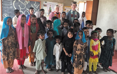 Cathal with primary school students