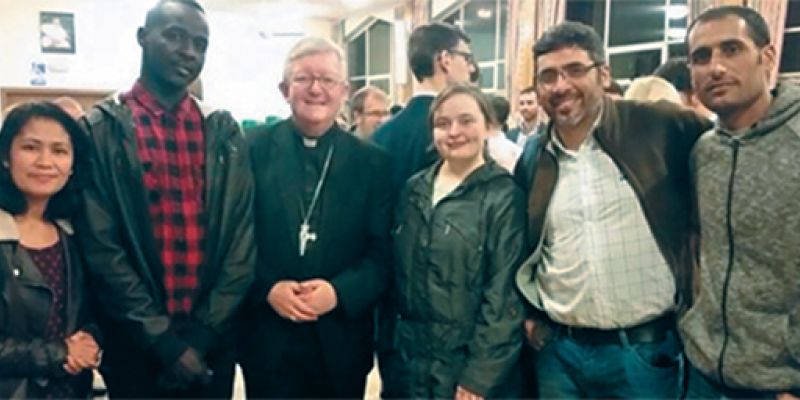 Julia with Archbishop Bernard (second from left) and lay missionaries.