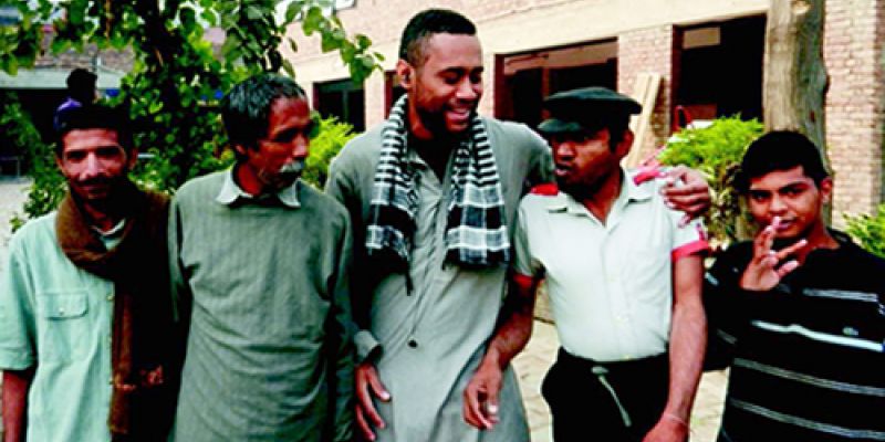 Paula (center) with friends in Pakistan