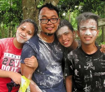 Fr. Kurt Zion Pala with kids from youth group